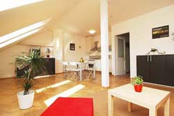 4 person deluxe 2 room apartment and 2 children with garden view, king bed, an extra bed, and private facilities (bath)